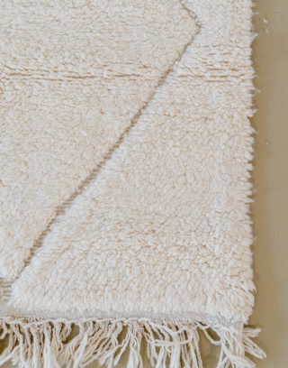 Zoom sur les franges de ce tapis