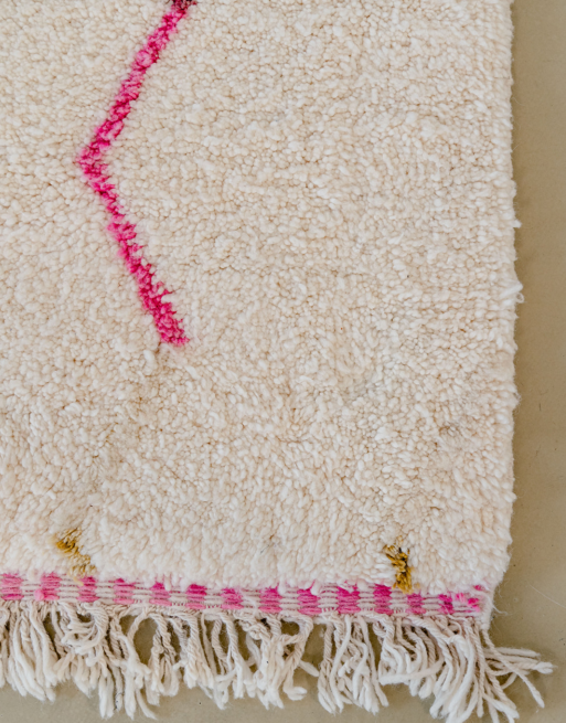 Zoom sur les franges de ce tapis